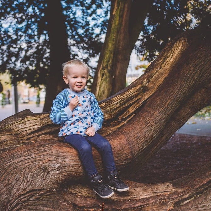 little boy wearing Tractor Sweatshirt from Toucan Blue | Cotswold Baby Co