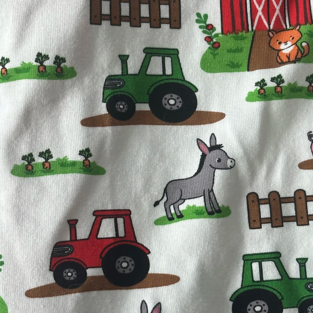 close up of tractors and donkey