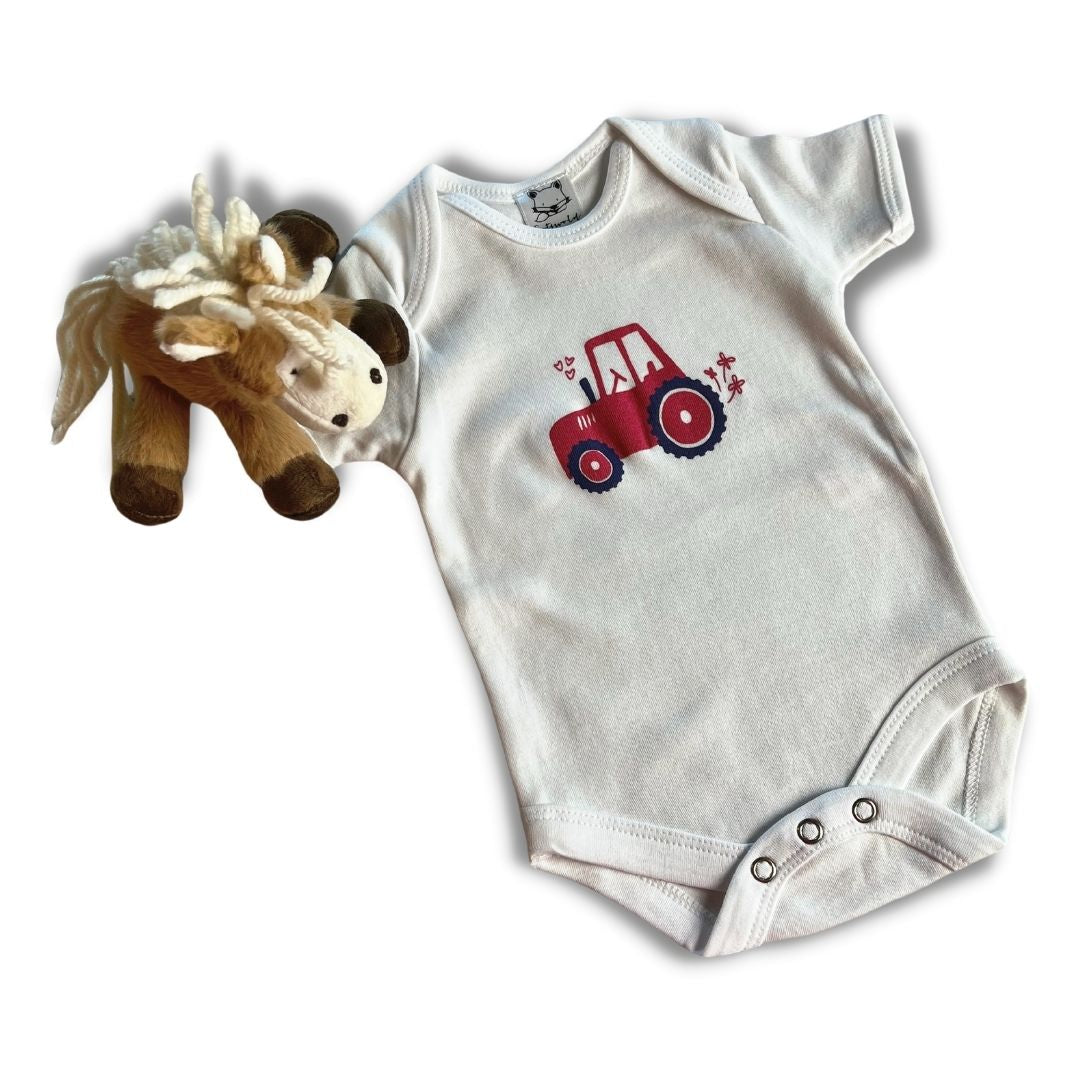 My First Pink Tractor Gift Set flatly on white background by. Cotswold Baby Co
