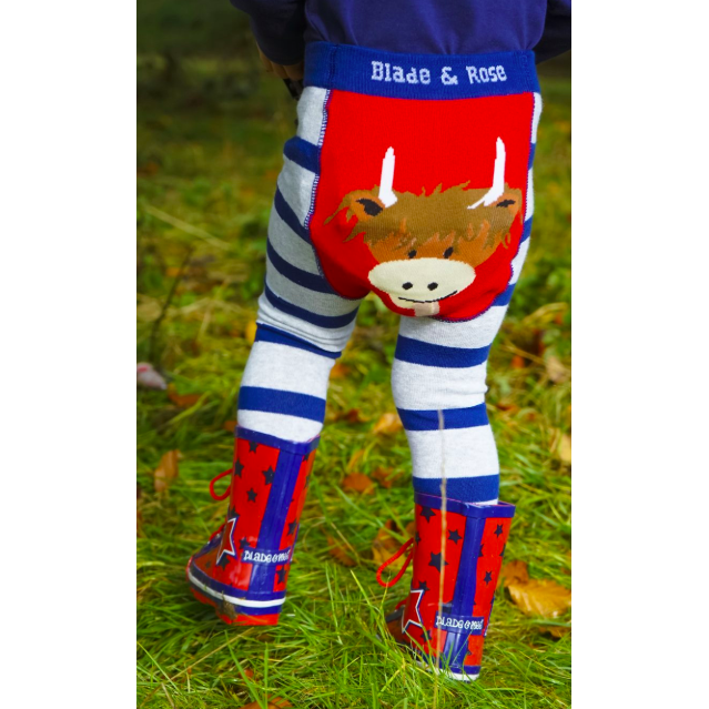 Child wearing Highland Cow leggings by Blade & Rose