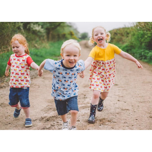 Little boy wearing Blue Tractor T-Shirt by Toucan Blue | Cotswold Baby Co