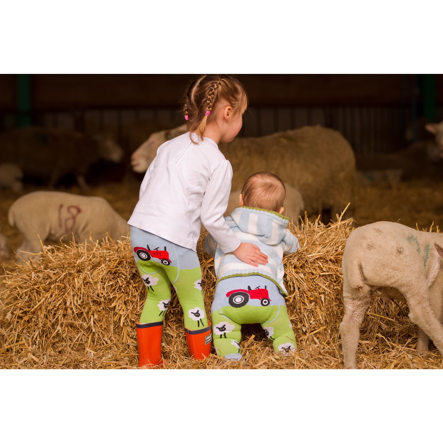 Girls wearing sheep leggings - Cotswold Baby Co